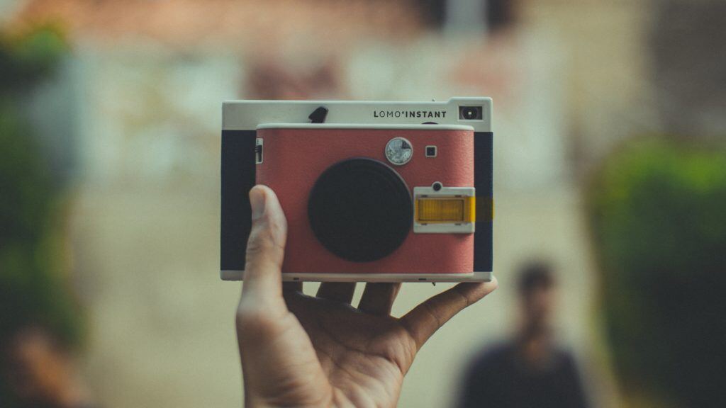 polaroid one step + sitting on box