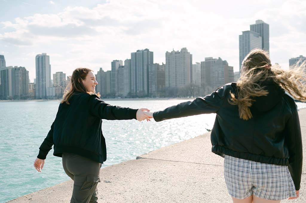 couple walking by the shore