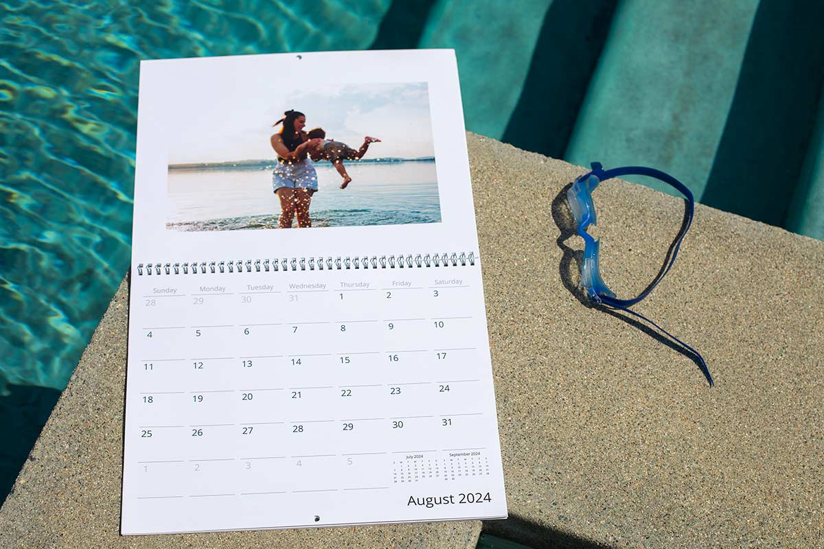 Summer photo calendar by a pool