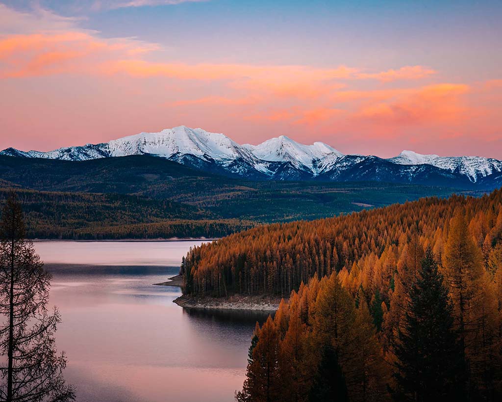 snowcapped mountains with fall leaves